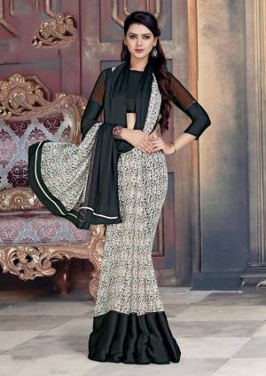 Be It Your Casual Or Semi-Casual Wear, This Saree Is Suitable For Both, Grab This Saree In White And Black Color Paired With Black Colored Blouse. It Is Georgette Based Beautified With Intricate Prints, Also It Is Light Weight And Easy To Carry All Day Long. 