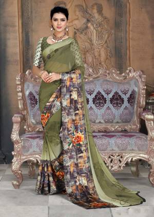 New Shade Is Here To Add Into Wardrobe With This Printed Saree In Olive Green Color Paired With Olive Green Colored Blouse. This Saree And Blouse Are Georgette Beautified With Prints All Over It.