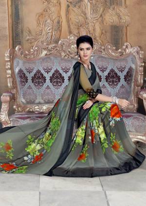 Flaunt Your Rich And Elegant Taste Wearing This Floral Printed Saree In Grey And Multi Color Paired With Grey Colored Blouse. This Saree And Blouse are Georgette Based Paired With Satin Georgette Blouse. 