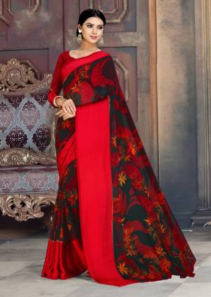 Add This Bold Looking Saree To Your Wardrobe For Casual Or Semi-Casual Wear In Red And Black Color Paired With Red Colored Blouse. This Saree Is Fabricated On Georgette Paired With Satin Georgette Blouse. 