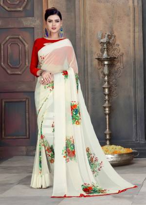 Simple and Elegant Looking Saree Is Here In white Color Paired With Red Colored Blouse. This Saree And Blouse Are Georgette Based Beautified With Prints All Over It.