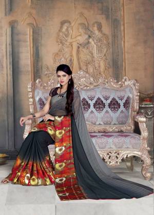 Flaunt Your Rich And Elegant Taste Wearing This Floral Printed Saree In Grey Color Paired With Black Colored Blouse. This Saree And Blouse are Georgette Based Paired With Satin Georgette Blouse. 