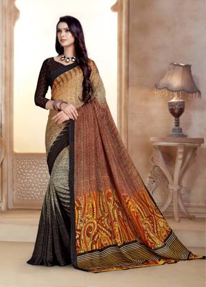 Simple Saree Is Here For Your Casual Wear In Beige And Brown Color Paired With Black Colored Blouse. This Saree And Blouse Are Fabricated On Satin Georgette Beautified With Prints All Over. 