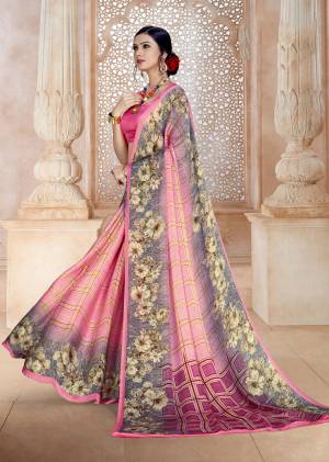 Look Pretty Wearing This Lovely Color Pallet With This Saree In Light Pink And Grey Color Paired With Light Pink Colored Blouse. This Saree And Blouse Are Fabricated On Satin Georgette Beautified With Checks And Floral Prints.