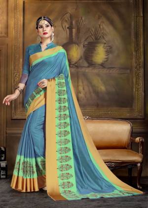 Add This Beautiful Silk Based Saree In Blue Color Paired With Blue Colored Blouse. This Saree And Blouse Are Fabricated On Art Silk Beautified With Printed Motifs. 