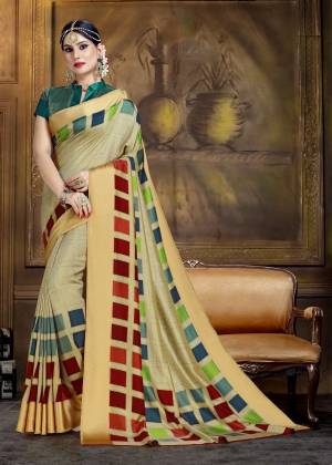 Go With The Shades Of Green With This Art Silk Based Saree In Mint Green Color Paired With Teal Green Colored Blouse. This Saree And Blouse Are Fabricated On Art Silk Beautified With Colorful Blocks Prints. 