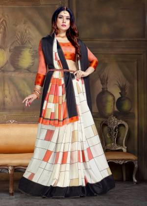 Simple And Elegant Looking Saree Is Here In White And Black Color Paired With Orange Colored Blouse. This Saree And Blouse Are Art Silk Based Beautified With Multi Colored Floral Prints. 
