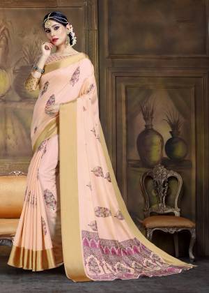 You Will Definitely Earn Lots Of Compliments Wearing This Pretty Saree In Pastel Peach Color Paired With Pastel Peach Colored Blouse. This Saree And Blouse Are Fabricated On Art Silk Beautified with Small Pretty Prints.