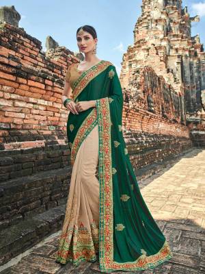 Impress everyone with your amazing Trendy look by draping this Pine green and Cream color two tone silk and silk shaded fabrics saree. this party wear saree won't fail to impress everyone around you. this gorgeous saree featuring a beautiful mix of designs. Its attractive color and designer heavy embroidered design, zari design work, patch design, attactive stone design, beautiful floral design all over in saree work over the attire & contrast hemline adds to the look. Comes along with a contrast unstitched blouse.
