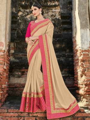 Gorgeously mesmerizing is what you will look at the next wedding gala wearing this beautiful beige color two tone silk saree. Ideal for party, festive & social gatherings. this gorgeous saree featuring a beautiful mix of designs. Its attractive color and designer heavy embroidered design, stone design and heavy designer blouse, beautiful floral design all over in saree work over the attire & contrast hemline adds to the look. Comes along with a contrast unstitched blouse.