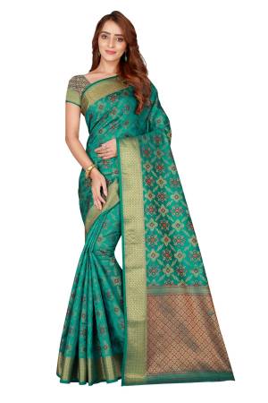 Bright And Visually Appealing Color Is Here With This Silk Based Saree In Green Color Paired With Multi Colored Blouse. This Saree And Blouse Are Fabricated On Kanjivaram Art Silk Beautified With Weave all Over It. 