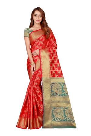 Here Is A Very Pretty Color Pallete With this Silk Based Saree In Red And Light Blue Color Paired With Light Blue Colored Blouse. This Saree And Blouse Are Fabricated On Kanjivaram Art Silk Beautified With Heavy weave All Over It. Buy This Designer Silk Saree Now.