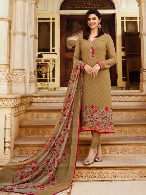 Simple And Elegant looking Designer Straight Suit Is Here In Beige Color Paired With Beige Colored Bottom And Dupatta. Its Top Is Crepe Based Paired With Santoon Bottom And Chiffon Dupatta. 