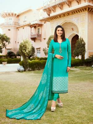 Very Pretty Shade Is Here To Add Into Your Wardrobe With This Designer Straight Suit In Turqoise Blue Color. Its Top Is Fabricated On Crepe Paired With Santoon Bottom And Chiffon Dupatta. 