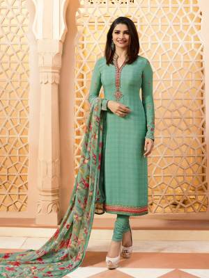 This Season Is About Subtle Shades And Pastel Play, So Grab This Designer Straight Suit In Pretty Pastel Green Color. Its Top Is Fabricated On Crepe Paired With Santoon Bottom And Chiffon Dupatta. Buy Now.
