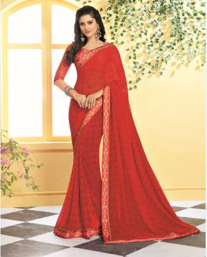 Adorn The Pretty Angelic Look Wearing This Saree In Red Color Paired With Red Colored Blouse. This Saree Is Georgette Based Paired With Satin Fabricated Blouse. 