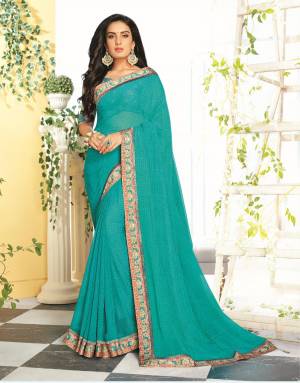 Here Is A Pretty Shade In Blue With This Saree In Sky Blue Color Paired With Sky Blue Colored Blouse. This Saree Is Fabricated On Georgette Paired With Satin Fabricated Blouse. Both Its Fabrics Are Soft Towards Skin And Ensures Superb Comfort All Day Long. 