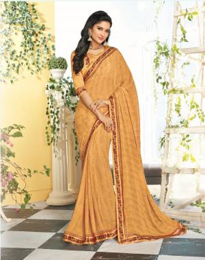 Simple and Elegant Looking Printed Saree Is Here In Beige Color Paired With Beige Colored Blouse. This Saree Is Georgette Based Paired With Satin Fabricated Blouse. It Is Light In Weight And Easy To Carry All Day Long. 