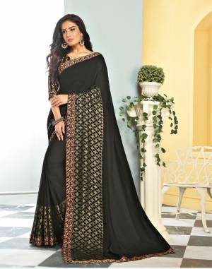 For A Bold And Beautiful Look, Grab This Designer Saree In Black Color paired With Black Colored Blouse. This Saree Is Georgette Based Paired With Satin Fabricated Blouse. It Is Light Weight And Also Durable. 