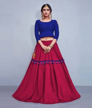 This Festive Season, Look The Most Unqiue And Trendy With This Designer Readymade Lehenga Choli In Royal Blue Colored Blouse Paired With Contrasting Magenta Pink Colored Lehenga. Its Blouse Is Silk Based With Cotton Fabricated Lehenga. It IS Beautified With Multi Colored Tassels And Lace. 