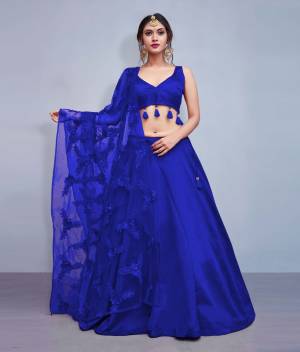 Earn Lots Of Compliments Wearing This Designer Lehenga Choli In Royal Blue Color Paired With Royal Blue Colored Dupatta. Its Blouse And Lehenga Are Silk Based Paired With Heavy Embroidered Net Fabricated Dupatta. Also Its Blouse Is Beautified With Tassels Giving It A Lovely Sleek Look.