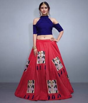 Here Is A Lovely Patterned Designer Lehenga Choli For Festive, Marriage Or Any Occasion Wear. Its Blouse Is In Royal Blue Color Paired With Contrasting Dark Pink Lehenga. Its Blouse IS Fabricated On Nylon Silk Paired With Art Silk Lehenga. It IS Beautified with Patch Work And Tassels. 