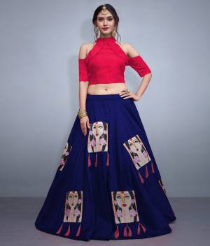 Here Is A Lovely Patterned Designer Lehenga Choli For Festive, Marriage Or Any Occasion Wear. Its Blouse Is In Dark Pink Color Paired With Contrasting Royal Blue Lehenga. Its Blouse IS Fabricated On Nylon Silk Paired With Art Silk Lehenga. It IS Beautified with Patch Work And Tassels. 