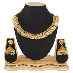 Give An Enhanced Look, Even To Your Simple Traditional Attire With This Beautiful Set Of Necklace In Golden Color. It Is Light In Weight And Can Be Carried Comfortably Throughout The Gala. Buy Now.