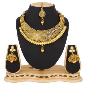 Add Glam To Your Attire Pairing It With This Lovely Set Of Necklace In Golden Color. This Can Be Paired With Any Colored Traditional Attire. Buy Now.