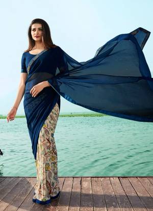 Enhance Your Personality Wearing This Lovely Saree In Dark Blue And Off-White Color Paired With Dark Blue Colored Blouse. This Saree Is Georgette Based Paired With Art Silk fabricated Blouse. Buy Now.