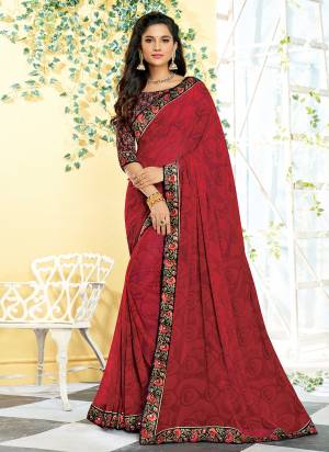 Shine Bright With This Saree In Maroon Color Paired With Multi Colored Blouse. This Saree Is Fabricated On Georgette Paired With Satin Fabricated Blouse. It Is Beautified With Prints And Also It Is Light In Weight And Easy To Carry All Day Long.