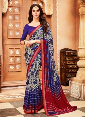 Grab This Beautiful Saree For Your Casual Or Semi-Casual Wear. This Saree Is Fabricated On Chiffon Georgette Paired With Soft  Silk Fabricated Blouse. It Is Light Weight And Easy To Carry All Day Long. 