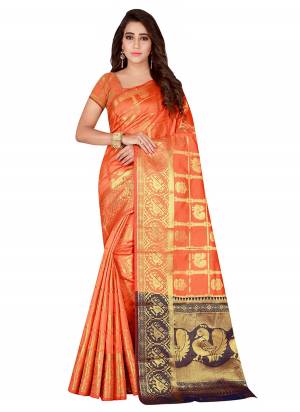 Celebrate This Festive Season With This Attractive Looking Orange And Violet Colored Saree Paired With Orange Colored Blouse. This Saree And Blouse Are Fabricated On Kanjivaram Art Silk Beautified With Weave all Over It. Buy Now.