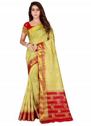 Simple, Elegant And Rich Looking Silk Based Saree Is Here In Cream And Red Color Paired With Red Colored Blouse. This Saree And Blouse Are Fabricated On Nylon Silk Beautified With Weave All Over It. 