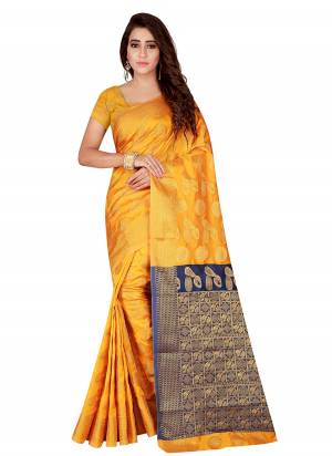 Celebrate This Festive Season With This Attractive Looking Yellow And Navy BlueColored Saree Paired With Yellow Colored Blouse. This Saree And Blouse Are Fabricated On Kanjivaram Art Silk Beautified With Weave all Over It. Buy Now.
