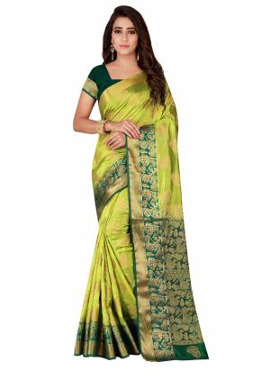 Go With The Shades Of Green With This Pretty Silk Based Saree In Parrot Green And Dark Green Color Paired With Dark Green Colored Blouse. This Saree And Blouse Are Fabricated On Nylon Silk Beautified With Weave All Over It.