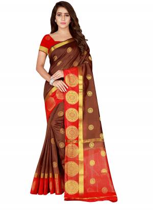 Enhance Your Personality Wearing This Lovely Silk Based Saree In Brown And Red Color Paired With Red Colored Blouse. This Saree And Blouse Are Fabricated On Nylon Silk Beautified With Weave. 