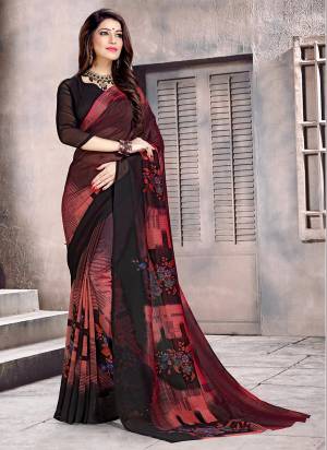 Have A Simple And Smart look With This Lovely Printed Saree Fabricated On Georgette. Its Fabric Is Soft Towards Skin And Ensures Superb Comfort All Day Long. 