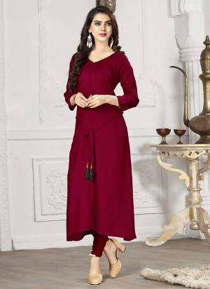 Grab This Designer Kurti For Your Semi-Casual Wear In Maroon Color Fabricated On Rayon. Its Fabric Is Soft Towards Skin And Available In All Regular Sizes.