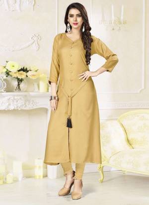 Enhance Your Personality In This Elegant looking Designer Readymade Kurti In Beige  Color Fabricated Rayon. It Is Light Weight And Easy To Carry All Day Long.