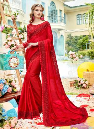 Adorn The Pretty Angelic Look Wearing This Heavy Designer Saree In Red Color Paired With Red Colored Blouse. This Saree Is Fabricated On Chiffon Paired With Net And Art Silk Embroidered Blouse. 