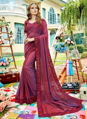 You Will Definitely Earn Lots Of Compliments In This Lovely Shade Of Wine. This Saree Is Fabricated On Silk Chiffon Paired With Art Silk Fabricated Blouse. Buy Now.
