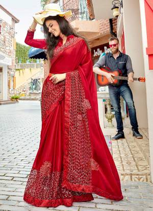 Adorn The Pretty Angelic Look In This Red colored Saree Paired With Red Colored Blouse. This Saree Is Fabricated On Chiffon Silk Paired With Art Silk  Fabricated Blouse. 
