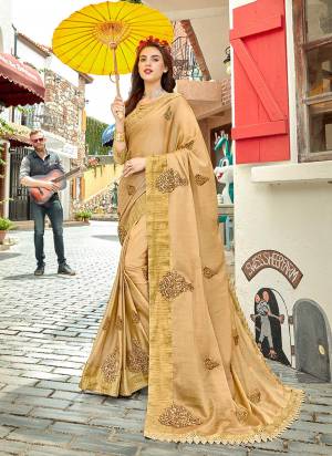 Simple And Elegant Looking Heavy Designer Saree Is Here In Beige Color Paired With Beige Colored Blouse. This Saree Is Fabricated On Silk Georgette Paired With Art Silk Fabricated Blouse. 