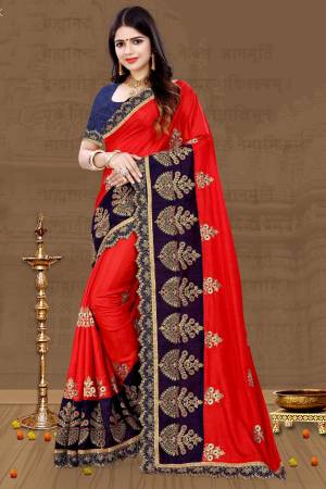 Celebrate This Festive Season Wearing This Beautiful Designer Saree In Red Color Paired With Contrasting Blue Colored Blouse. This Saree And Blouse Are Fabricated On Art Silk Beautified With Heavy Embroidery, Buy Now.