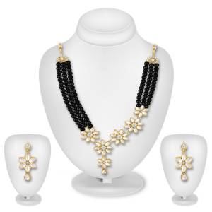Grab This Very Pretty Designer Necklace Set Beautified With Colored Pearl And Stone Work, This Pretty Set Comes With A Set Of Earrings. Also It Can Be Paired With Any Same Or Contrasting Colored Traditional Attire. 