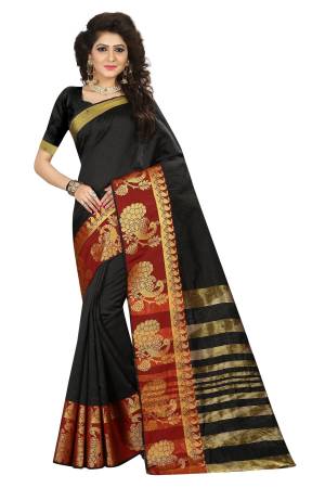 For A Bold And Beautiful look, Grab This Saree In Black With Black Colored Blouse. This Saree Is Fabricated On Cotton Silk Paired With Art Silk Fabricated Blouse. It Is Beautified With Broad Weaved Border. 