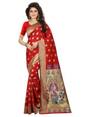 Adorn The Pretty Angelic Look Draping This Lovely Red Colored Saree Paired With Red Colored Blouse. This Saree And Blouse Are Silk Based Beautified With Weave All Over. 