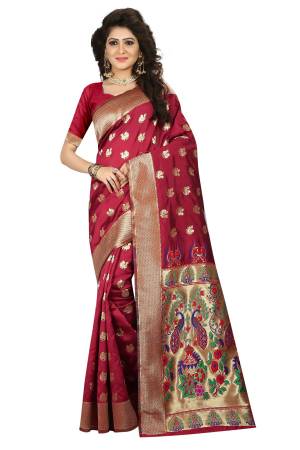 For A Royal Look, Grab This Silk Based Saree In Maroon Color Paired With Maroon Colored Blouse. Its Rich Color And Rich Jacquard Silk Fabric Will Earn You Lots Of Compliments From Onlookers. 