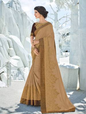 You Look elegant and stylish this festive season by draping this Beige color silk fabrics saree. Ideal for party, festive & social gatherings. this gorgeous saree featuring a beautiful mix of designs. Its attractive color and designer heavy embroidered design, Flower zari design, stone work, heavy designer blouse, beautiful floral design work over the attire & contrast hemline adds to the look. Comes along with a contrast unstitched blouse.